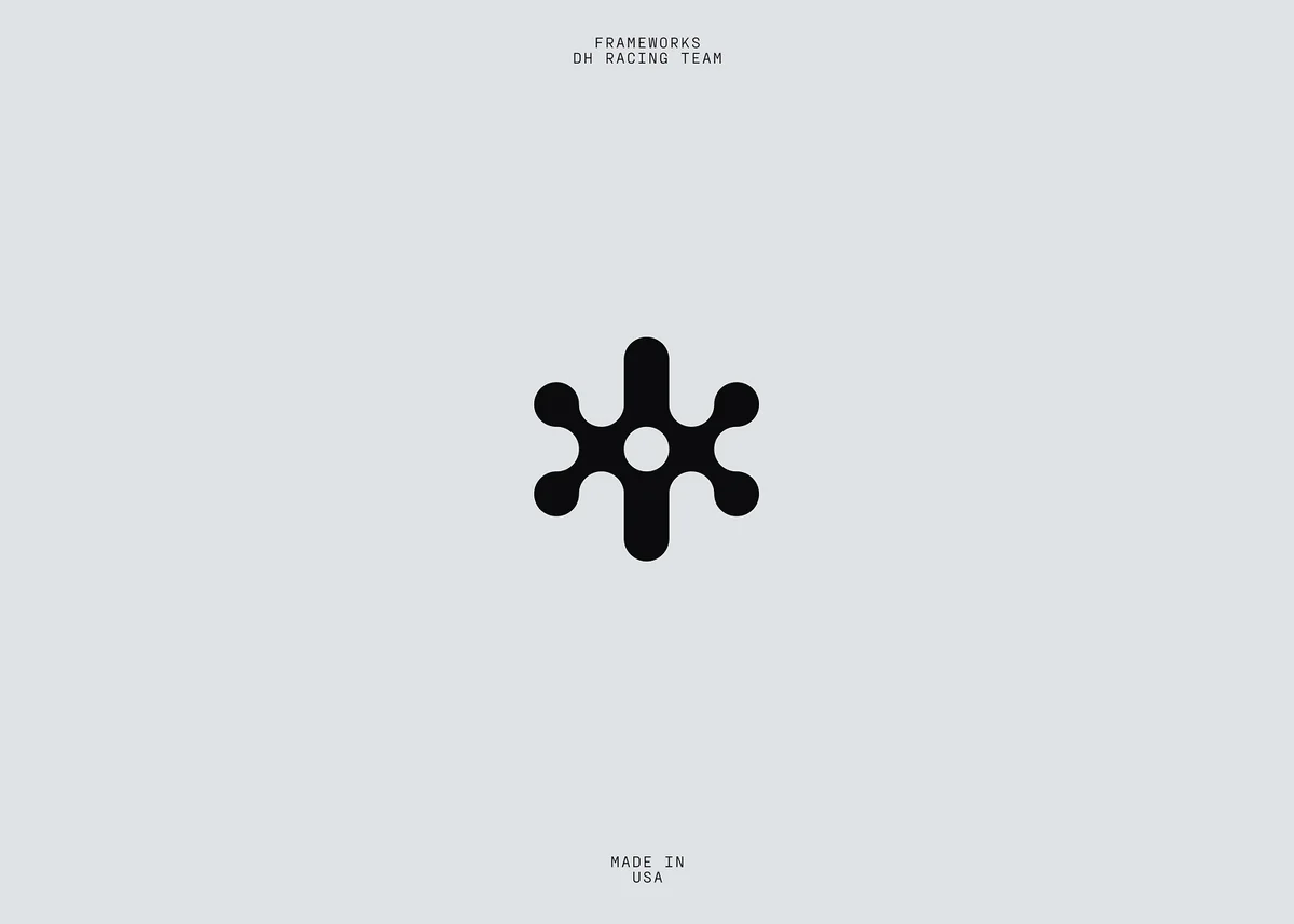 Black abstract brand mark on a pale gray background